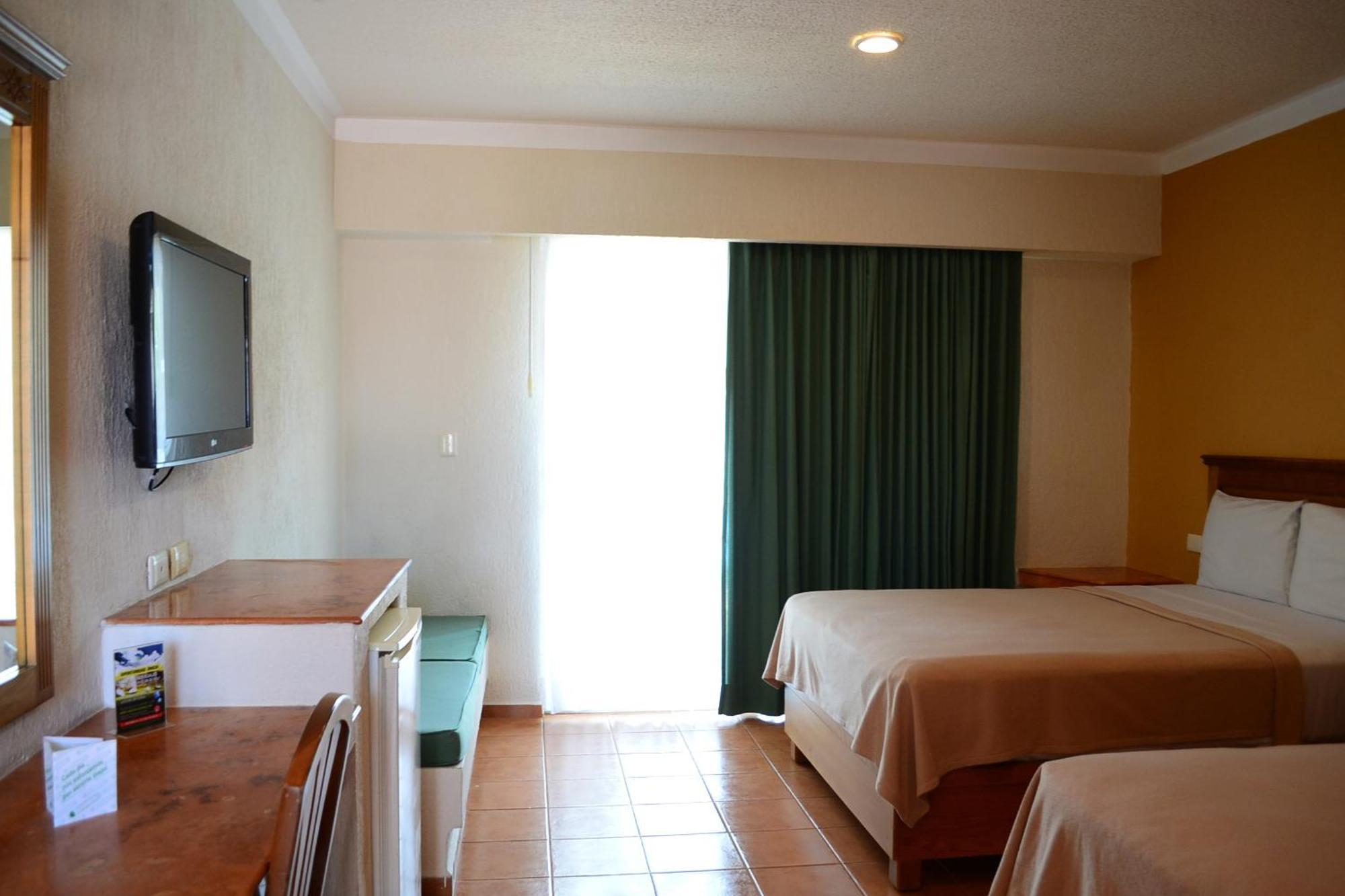 Tecnohotel Mérida Norte Habitación foto